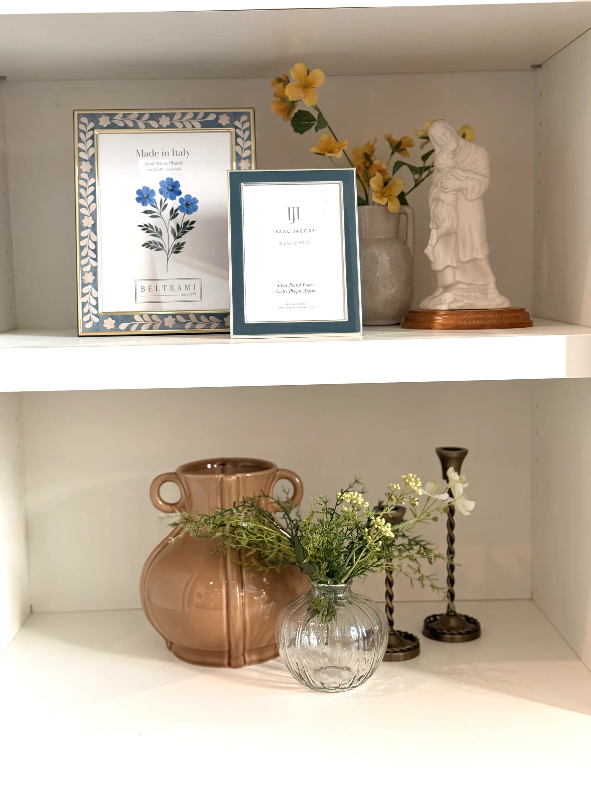 Styled shelf vignette with framed art and ceramics by BK Toolbox
